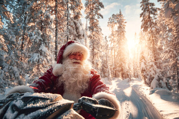 A bearded Santa Claus in a red coat rides a snowmobile in the forest on Christmas Eve. A portrait of an elderly Santa riding along a snowy path