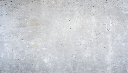 Obraz premium Close-up of a light gray concrete wall with a rough, textured surface and subtle imperfections.