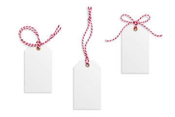 Three blank paper gift tags, hang tags, price tags or cloth labels with red and white twisted string isolated on a transparent background, PNG. High resolution. Christmas or holiday label for presents