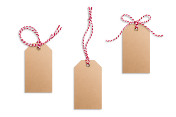 Three blank kraft paper gift tags, hang tags, price tags or cloth labels with red and white twisted string isolated on a transparent background, PNG. High resolution. Christmas or holiday label 
