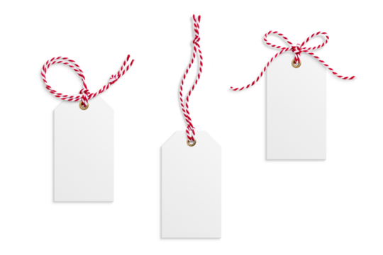 Three blank paper gift tags, hang tags, price tags or cloth labels with red and white twisted string isolated on a transparent background, PNG. High resolution. Christmas or holiday label for presents - Powered by Adobe