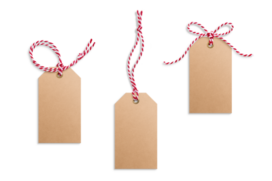 Three blank kraft paper gift tags, hang tags, price tags or cloth labels with red and white twisted string isolated on a transparent background, PNG. High resolution. Christmas or holiday label - Powered by Adobe