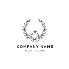 Obraz premium Elegant Laurel Wreath with Diamond Ring and Initials Logo Design.