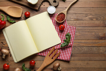 Composition with blank recipe notebook and ingredients on wooden background