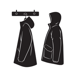 Black silhouette of two hooded parkas one hanging on a wall hook and one standing jacket hooded jacket © Natural vibes