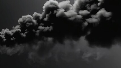 A view of thick dark smoke rising and billowing against a dark gray sky in a monochrome image smoke background video