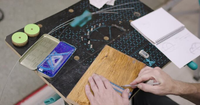 Crafting geometric patterns using inspired tools and creativity in a workshop setting