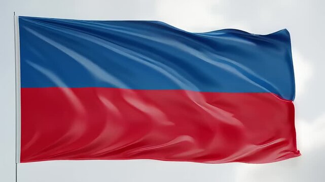 Vibrant Haitian Flag Waving Proudly in the Wind on a Clear Day.