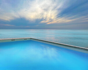 Swimming pool with clear water and infinity view on ocean