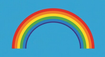 Brightly colored rainbow arc against a clear blue sky.