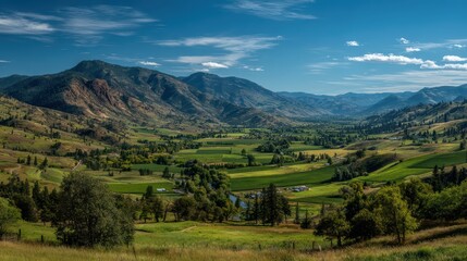 Obraz premium Serene Landscape of Rolling Hills and Lush Green Valley Under Blue Sky