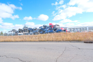 Scarped cars at a vehicle junk scrapyard