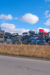 Scarped cars at a vehicle junk scrapyard