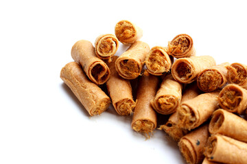 Rolled crispy wafers filled with shredded pork floss, Thai snack.