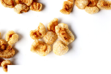 Crispy pork cracklings, a crunchy savory snack.