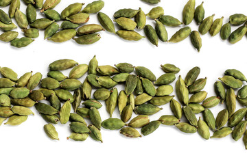 Green cardamom pods with aromatic and medicinal benefits.