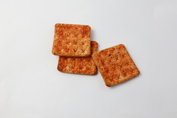 Stack of Spicy Crackers isolated on White Background