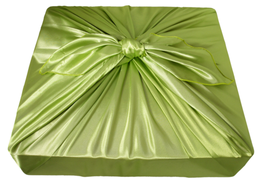 밝은 연두색의 비단 보자기로 포장된 선물