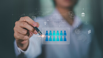 Digital data analysis and audience segmentation concept showing businessperson using virtual interface with people icons and global network graphics for marketing, management, and AI strategy.