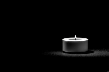 Single Candle Burning in Complete Darkness.