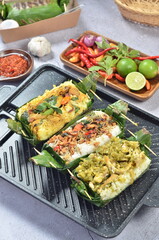 Grilled rice with its variations, wrapped in banana leaves, a traditional Indonesian food