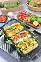 Grilled rice with its variations, wrapped in banana leaves, a traditional Indonesian food