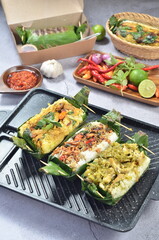 Grilled rice with its variations, wrapped in banana leaves, a traditional Indonesian food