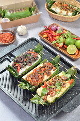 Grilled rice with its variations, wrapped in banana leaves, a traditional Indonesian food