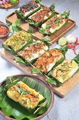 Grilled rice with its variations, wrapped in banana leaves, a traditional Indonesian food