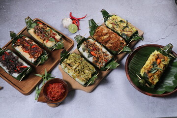 Grilled rice with its variations, wrapped in banana leaves, a traditional Indonesian food