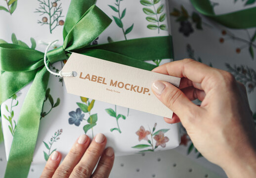 Gift Box Wrapped With Floral Patterned Paper With A Card Mockup