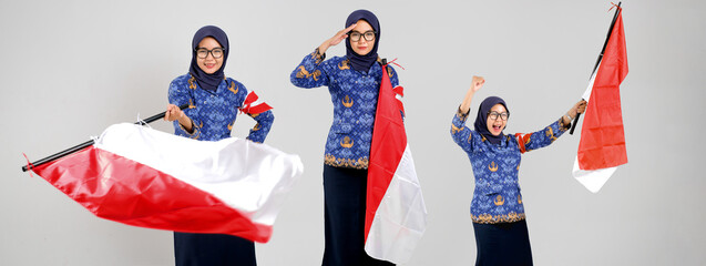 female civil servants wearing Indonesian Korpri uniform proudly holding red and white flags, symbolizing patriotism and unity. Perfect for Independence Day, Youth Pledge or ASN campaign.