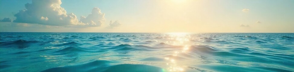 Obraz premium Serene Ocean Scene Sunlight Glistening on Calm Water, Evoking Bliss and Tranquility - Perfect for Relaxation and Wellness