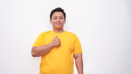 Young Asian fat men gesturing sign language on isolated background