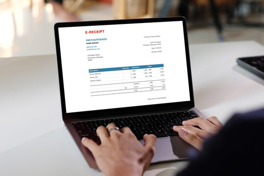 Hand using laptop computer with E ceceipt on screen, Telefinance, Business technology and lifestyle