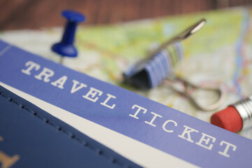 Travel ticket and map preparation for a weekend getaway