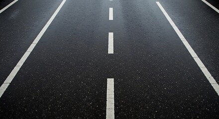Road with White Dotted Center Line on Wet Asphalt