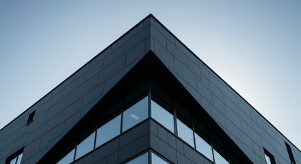 Obraz premium Modern Minimalist Building Corner Against Clear Sky.