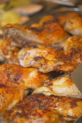 Grilled chicken served on a large platter at a picnic