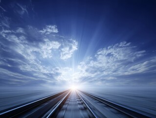 地平線の彼方へと続く線路と朝日の光が象徴する希望と未来への道
