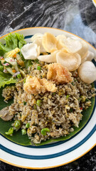 Fried Rice with Tomato Slices, Green Chilies, Myanmar, Burmese Famous Traditional Fermented Green Tea Mixed Salad Cuisine.	