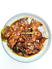 Authentic Semur Ayam Kentang Indonesian Comfort Food Served on a White Plate