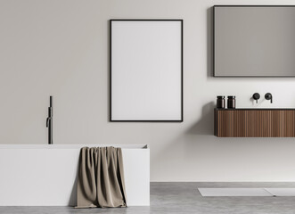 Minimal bathroom interior with blank poster frame on clean wall, modern bathtub, wooden cabinet, and accessories. 3D Rendering