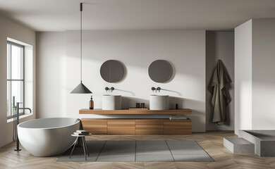 Contemporary bathroom with white freestanding tub, wood vanity, round mirrors and soft lighting on neutral wall background. Concept of luxury relaxation. 3D Rendering