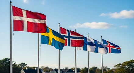 Scandinavian Flags Waving Proudly Against a Blue Sky.