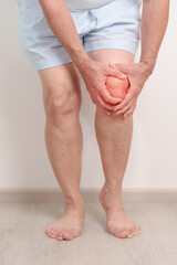 Elderly woman having knee ache and muscle pain due to Runners Knee or Patellofemoral Pain Syndrome,...
