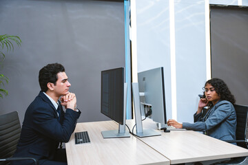 Two programmer is dealing with the stress and anxiety of working on computer code at the office.