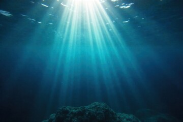 Sunbeams Piercing Through Ocean Surface An exceptionally clear and serene underwater scene where intense, golden shafts of sunlight pierce through the ocean s surface. These sunbeams create dramatic,