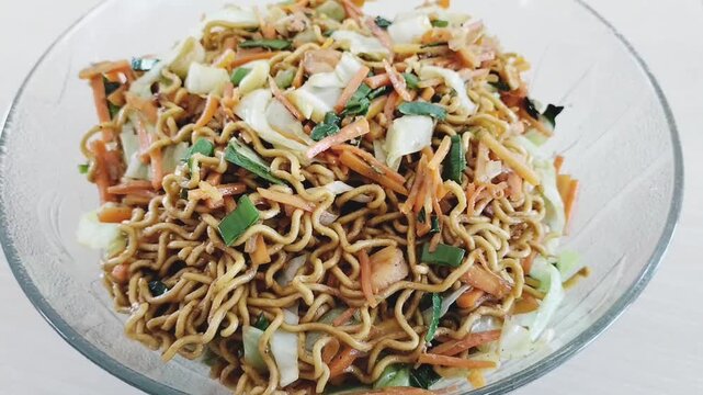 Selective focus. Indonesian traditional noodle for event. Domestic life.