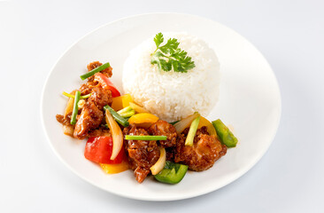 Crispy fried chicken with sweet and sour sauce on rice